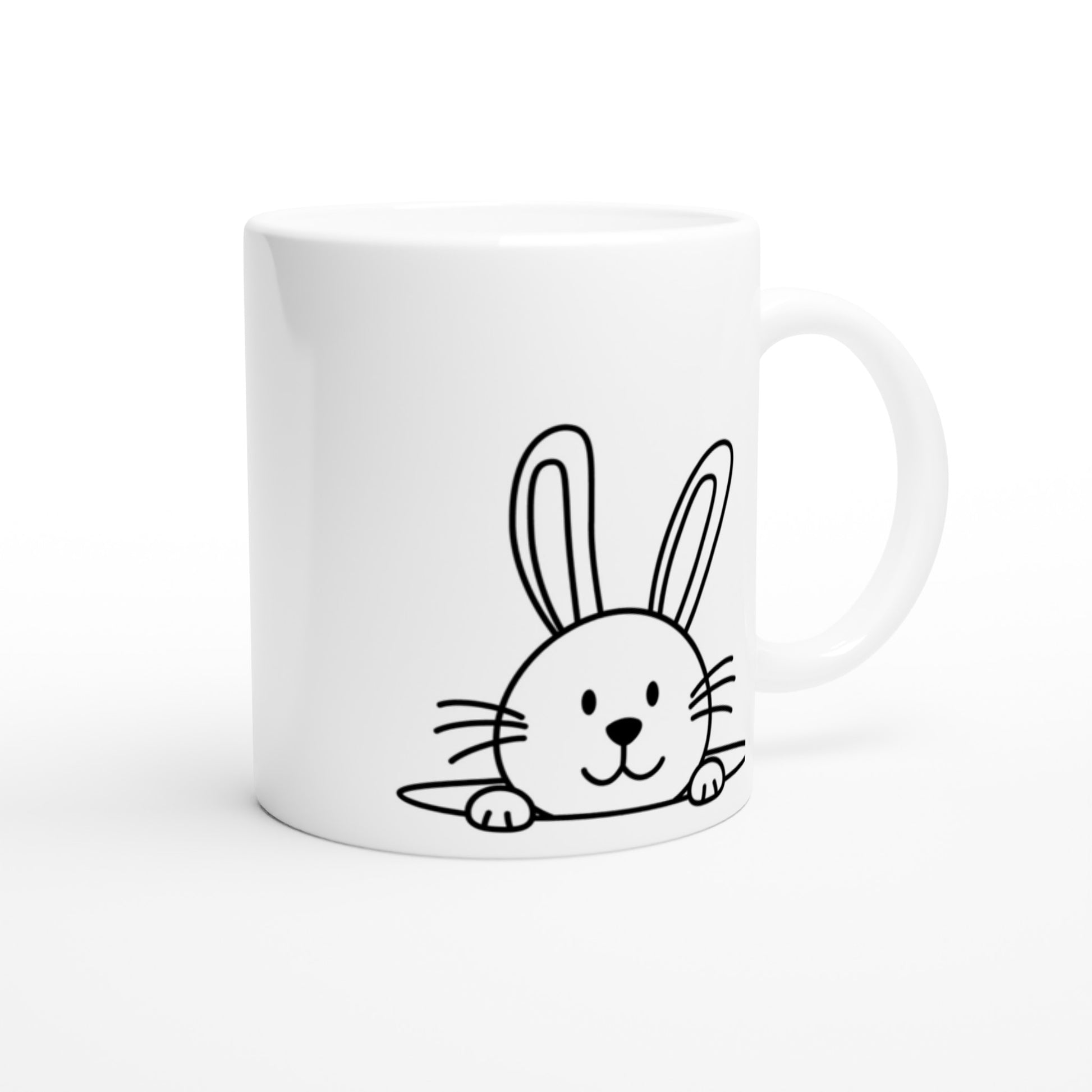 Taza con diseño de cara de conijitos