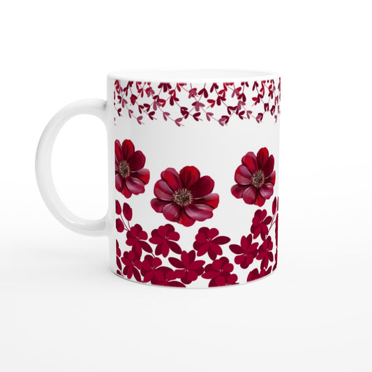 Taza bonita con flores rojas