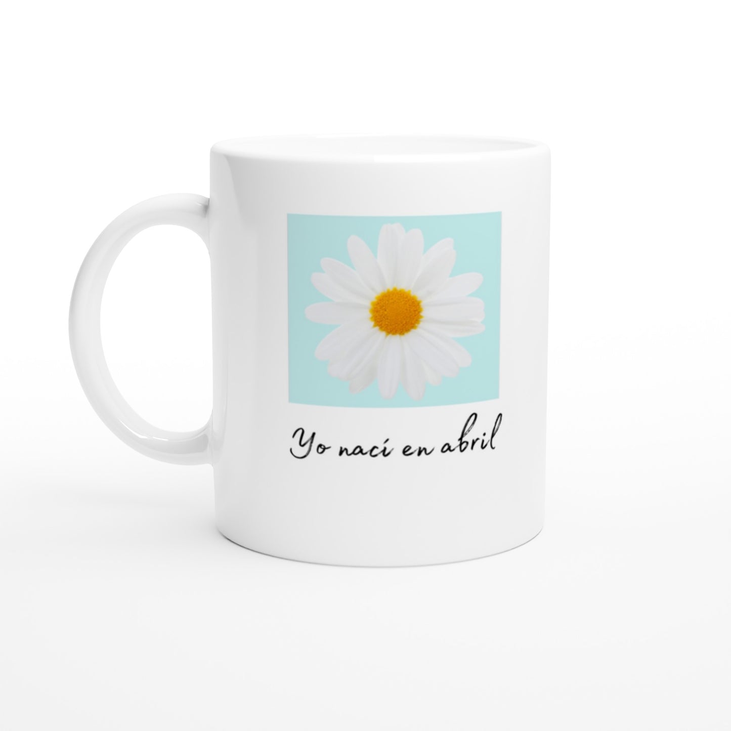 Bonita taza con una flor blanca y texto para los nacidos en abril 