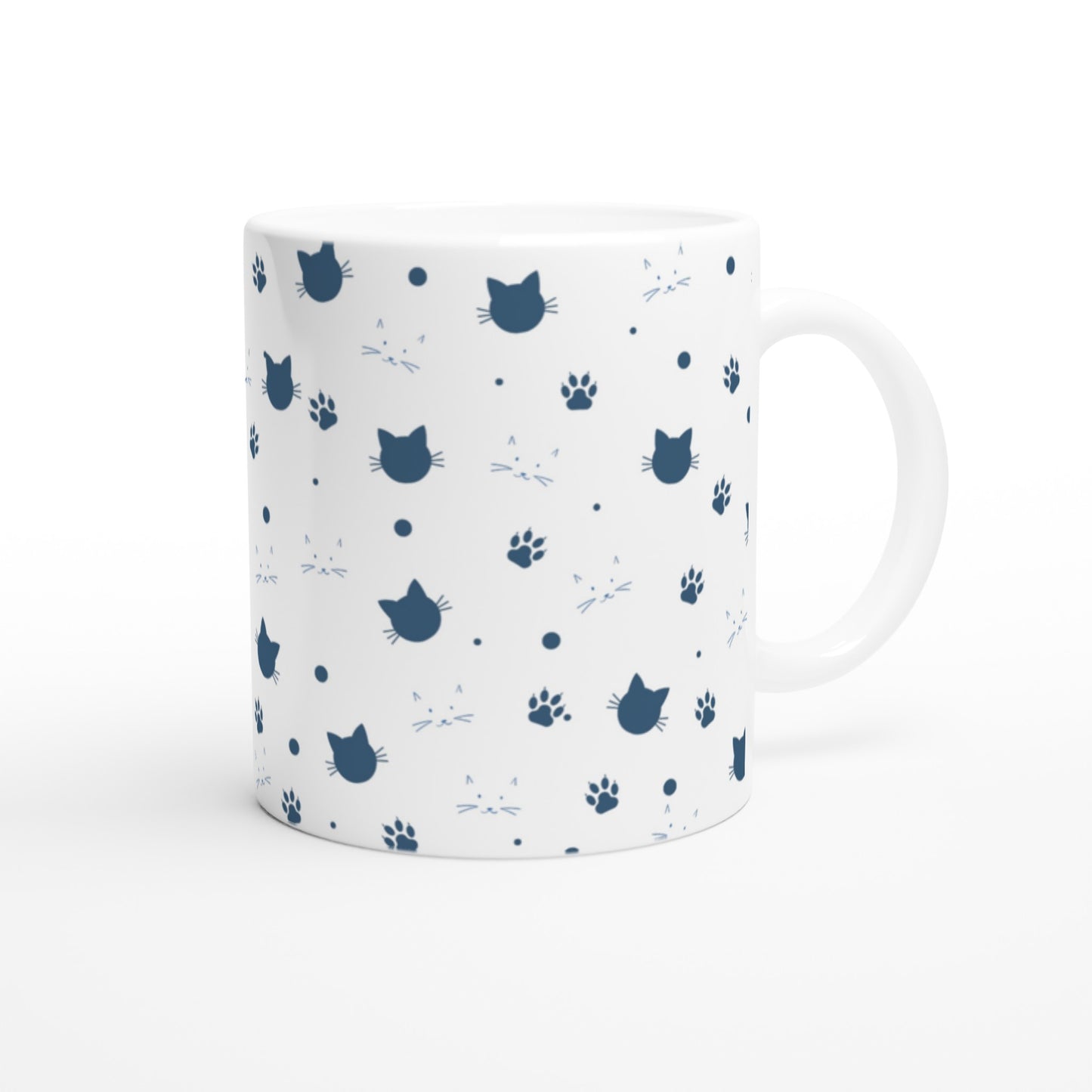 Taza para café con cara de gatitos y huellas
