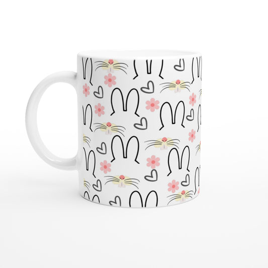 Taza de cerámica con conejos