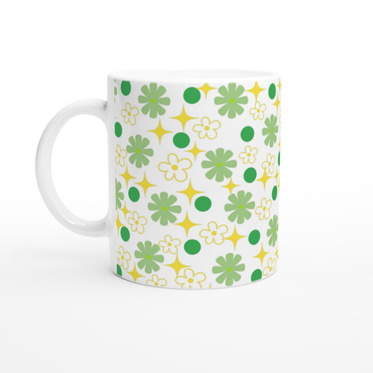 Taza bonita de flores verdes y amarilla